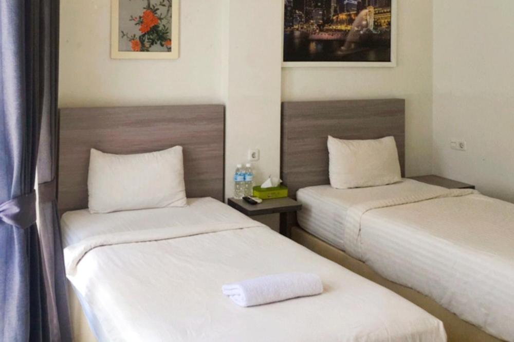 Twospaces Living At Maximus Inn Palembang Extérieur photo