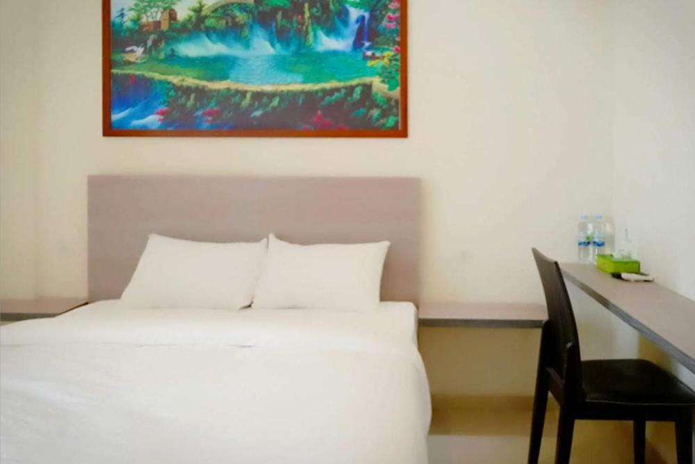 Twospaces Living At Maximus Inn Palembang Extérieur photo