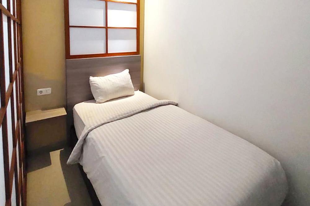 Twospaces Living At Maximus Inn Palembang Extérieur photo